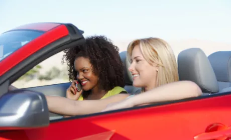 young girls driving car