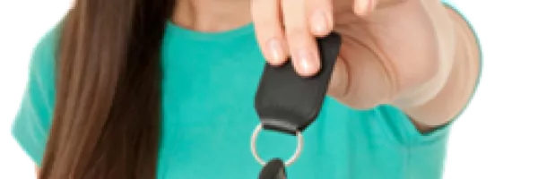 hand holding car key